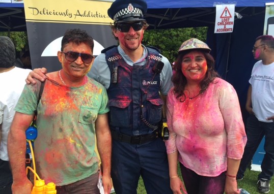 Crowd “jumpstarted” Bollywood-style at Holi event.